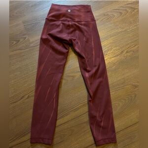 Lululemon red leggings size two perfect condition